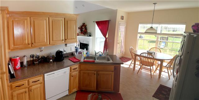 82 Bradshaw Road Lebanon, TN 37087 - Photo 6 of 20 a kitchen with a sink stove and cabinets