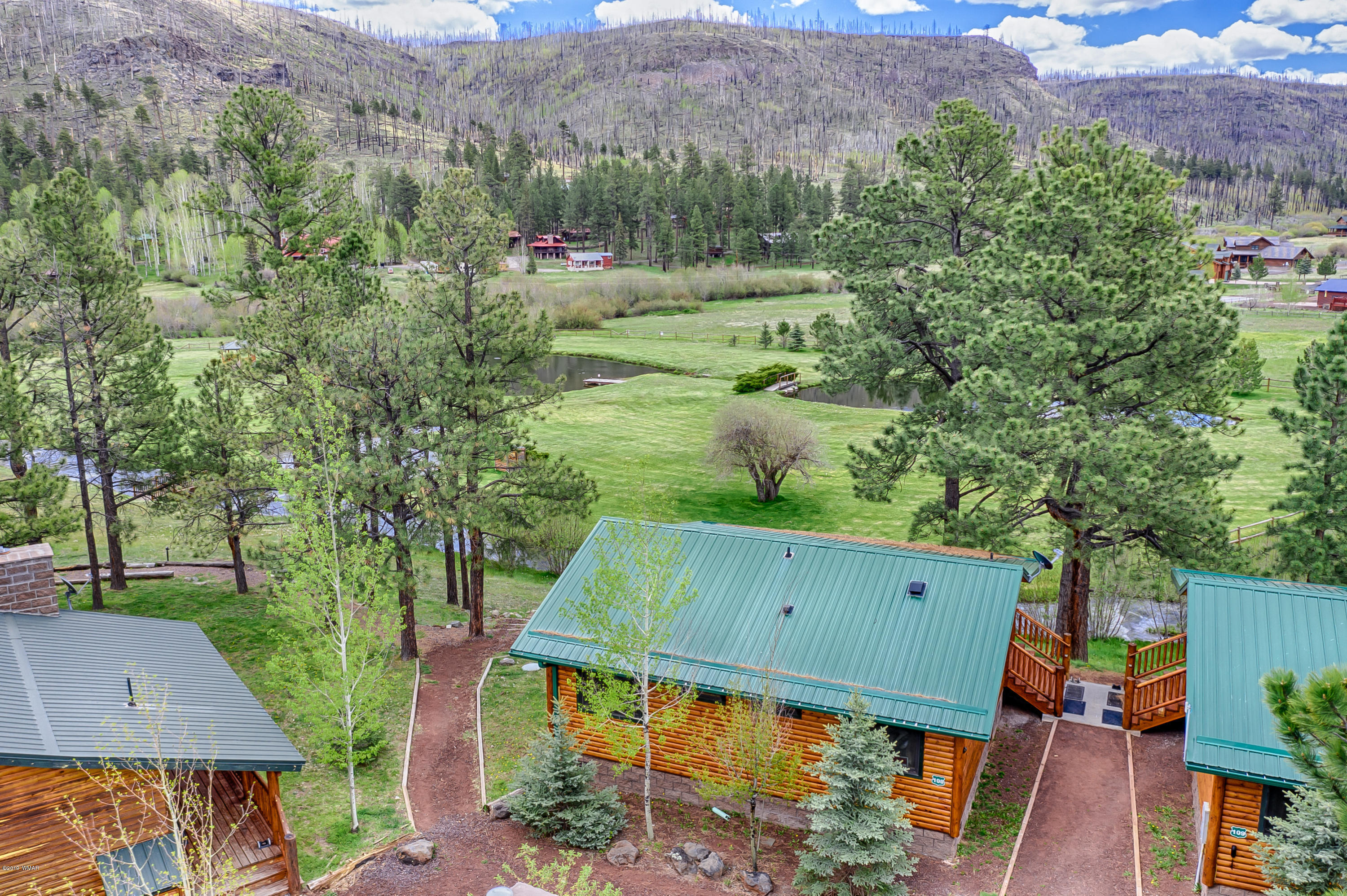 1120 Main, Unit 108 Greer, AZ 85927 - Photo 13 of 35 an aerial view of a house