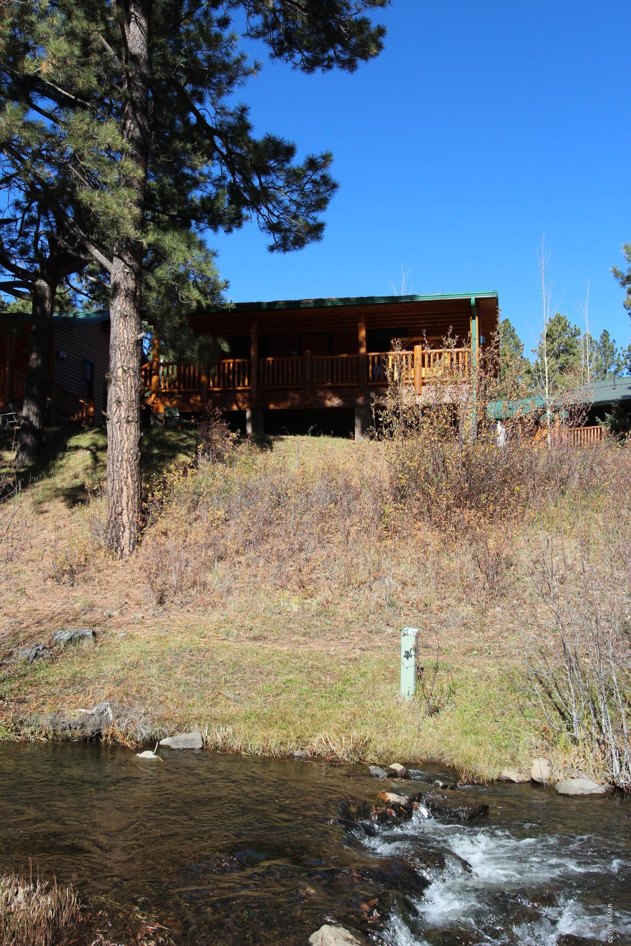 1120 Main, Unit 108 Greer, AZ 85927 - Photo 20 of 35 a view of a yard with snow