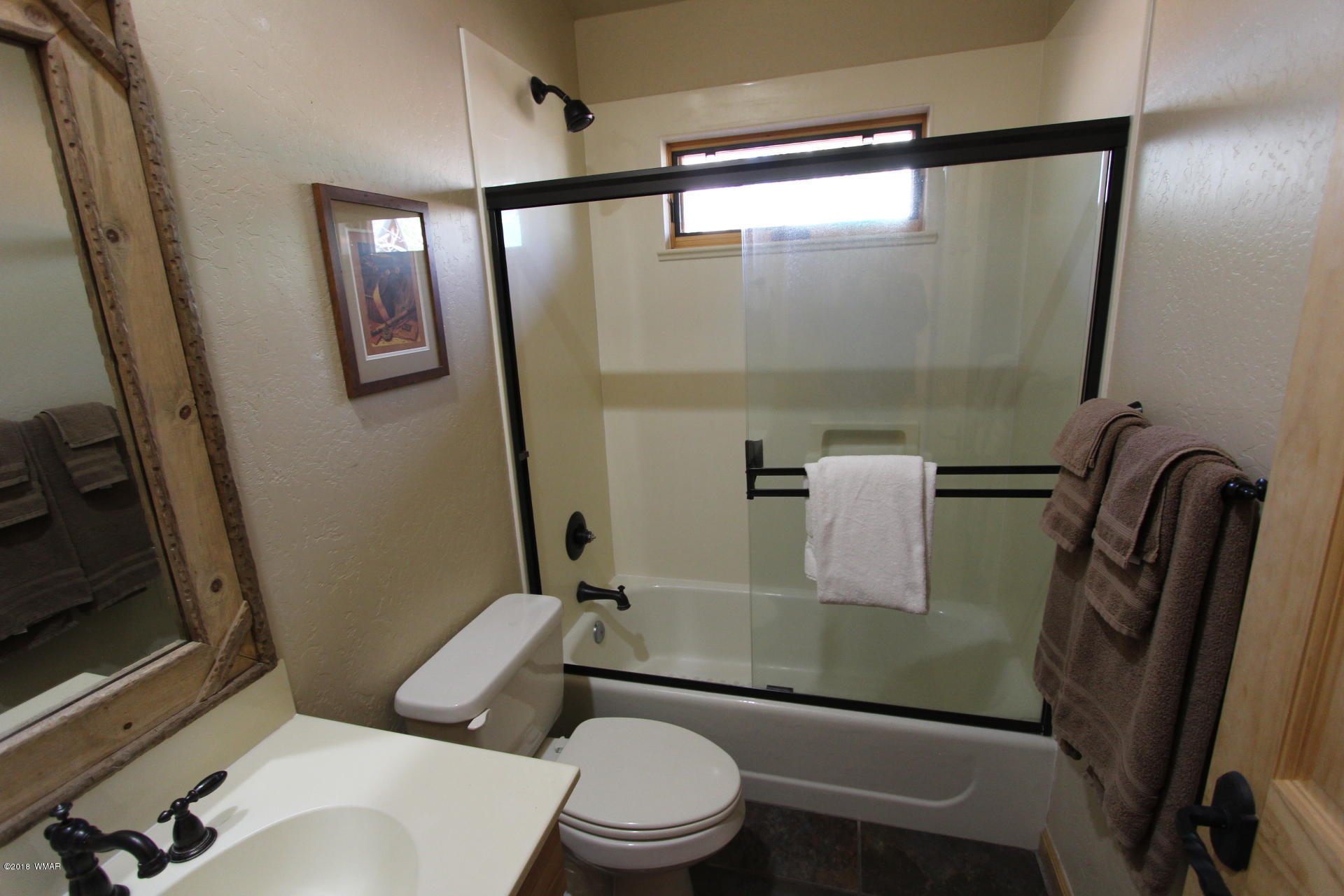 1120 Main, Unit 108 Greer, AZ 85927 - Photo 28 of 35 a bathroom with a toilet and a shower