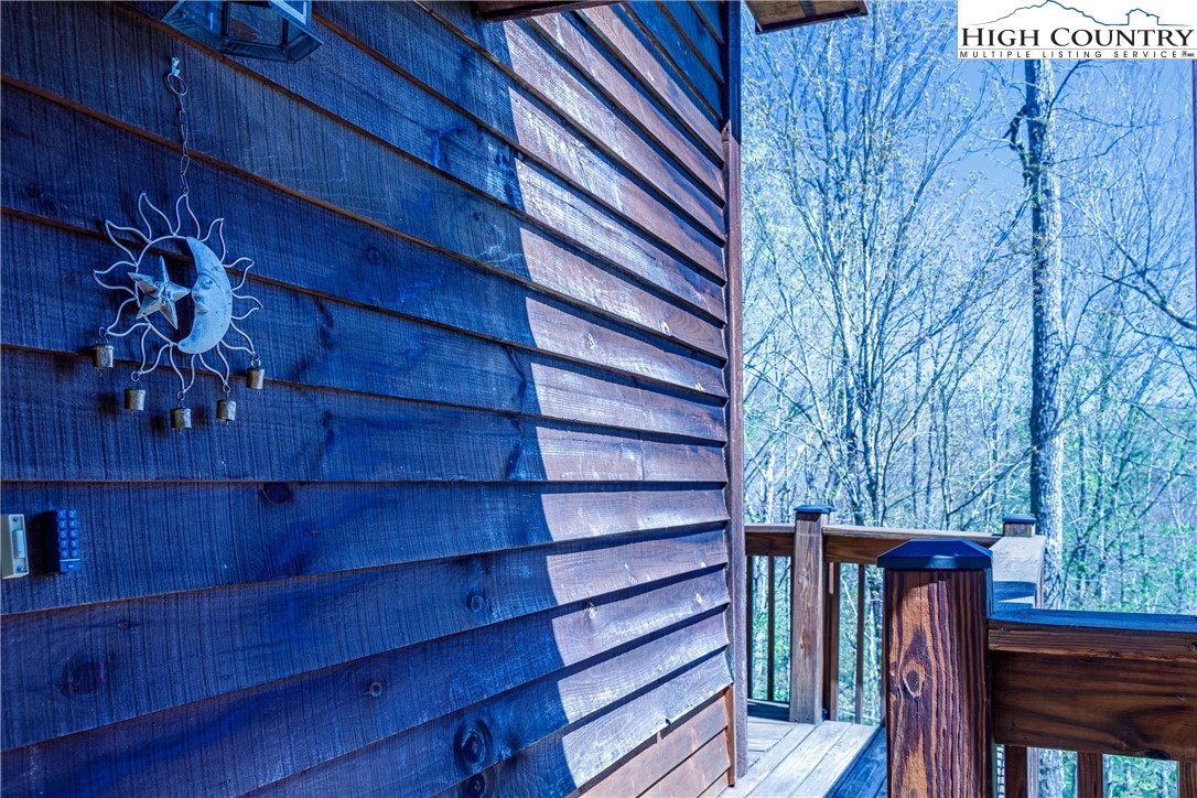 185 Marc Street Boone, NC 28607 - Photo 18 of 30 a view of a balcony with wooden floor and outdoor seating