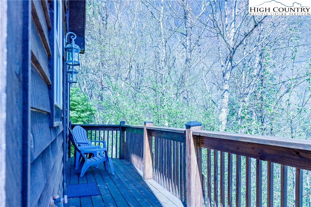 185 Marc Street Boone, NC 28607 - Photo 19 of 30 a view of balcony with wooden floor and outdoor seating