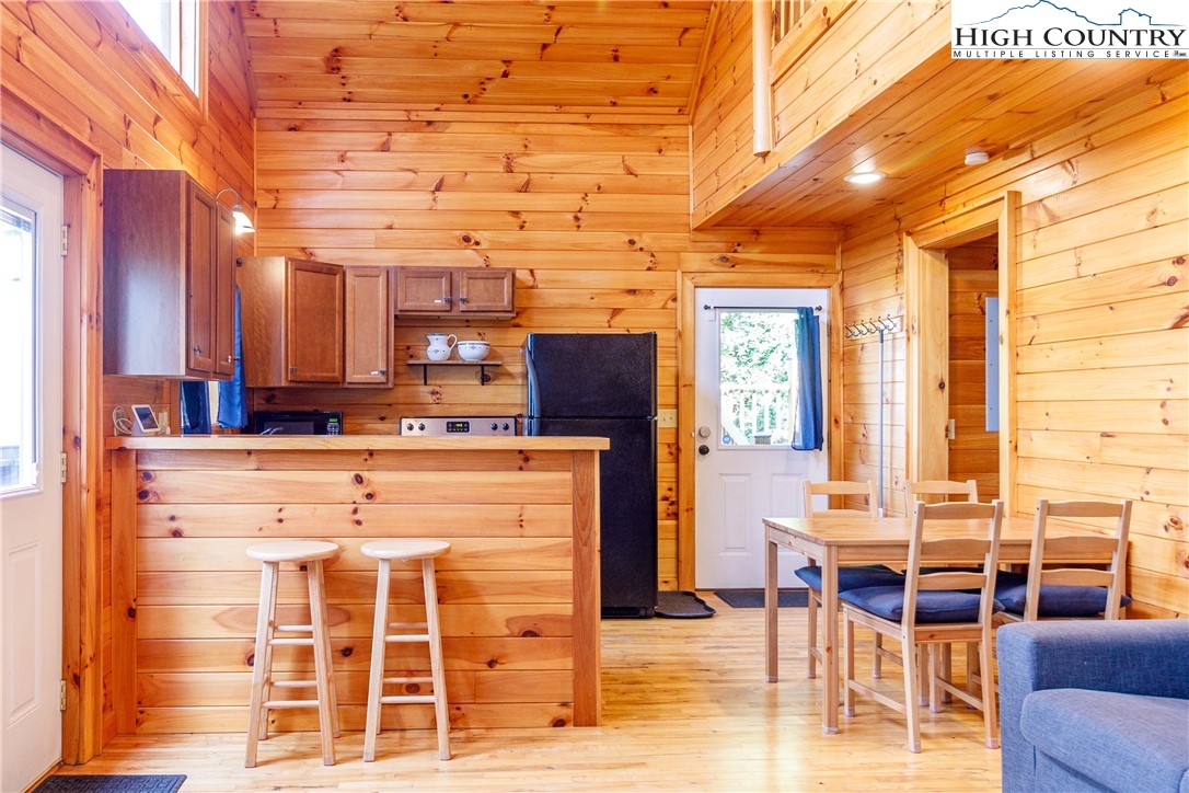 185 Marc Street Boone, NC 28607 - Photo 4 of 30 a view of a dining room with furniture and chandelier