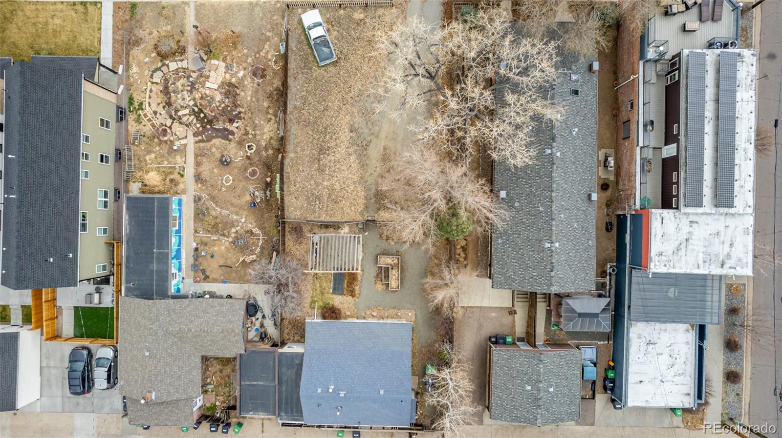 aerial view of residential houses with outdoor space