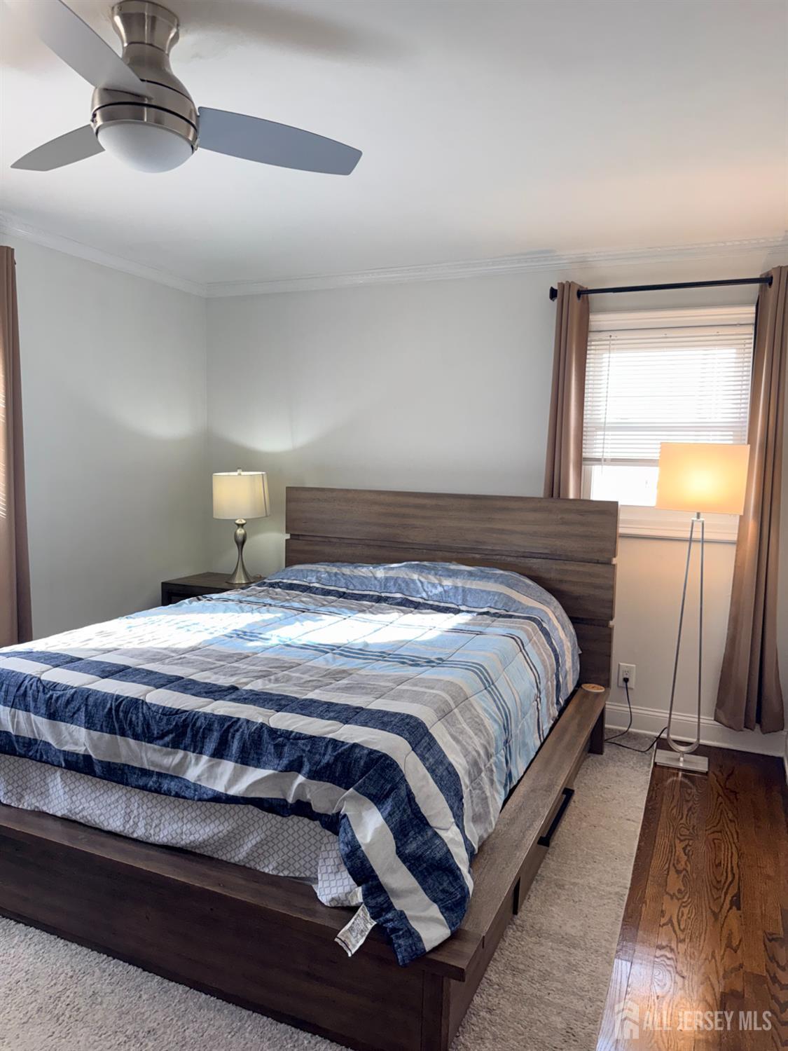 27 Rector Avenue Woodbridge, NJ 07095 - Photo 13 of 29 a bedroom with a bed and window