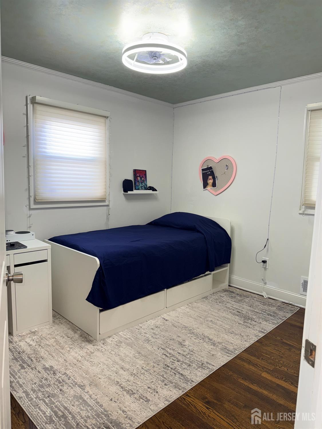 27 Rector Avenue Woodbridge, NJ 07095 - Photo 19 of 29 a bedroom with a bed and a dresser