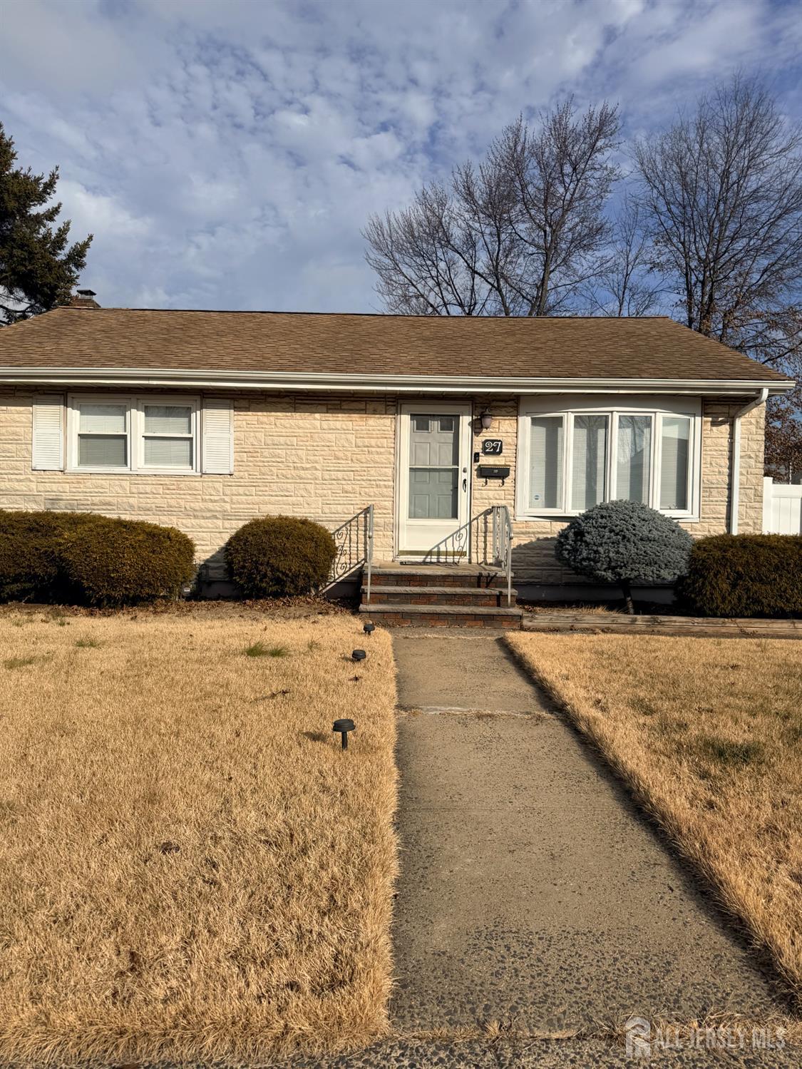 27 Rector Avenue Woodbridge, NJ 07095 - Photo 2 of 29 a front view of a house with yard