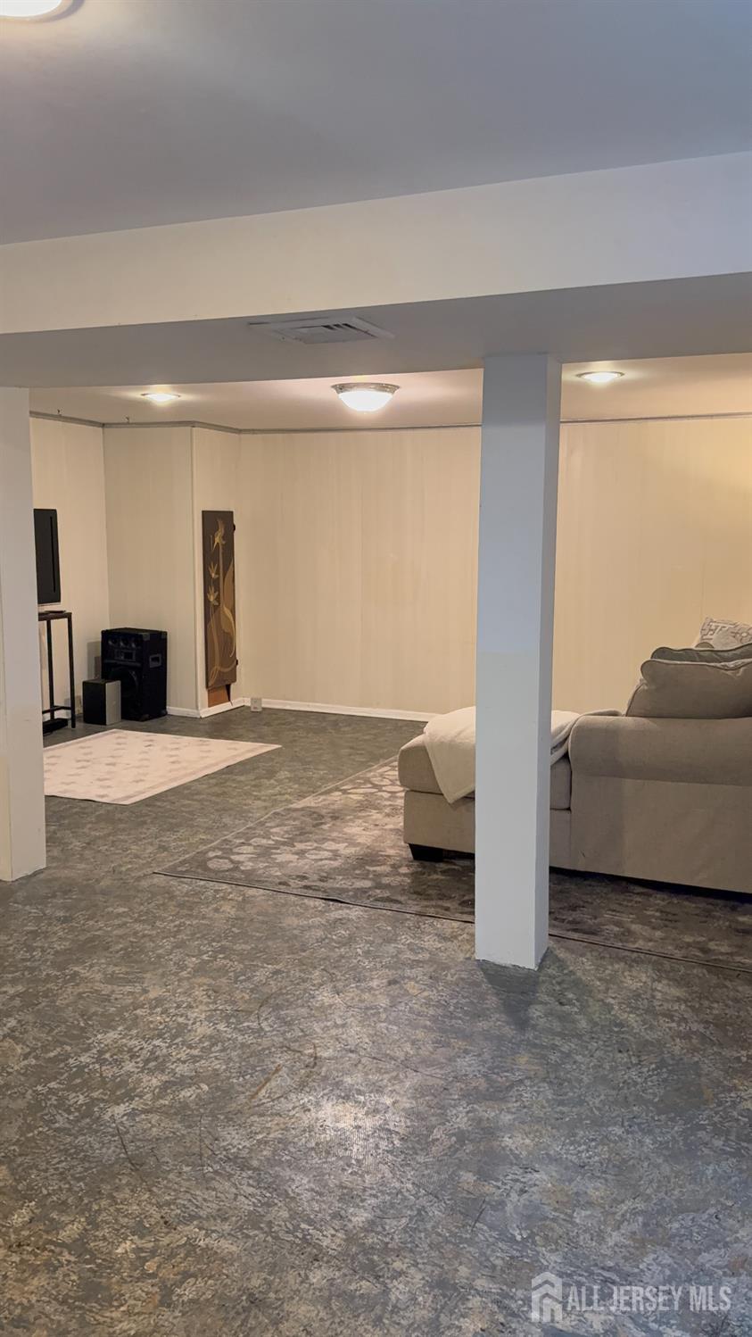 27 Rector Avenue Woodbridge, NJ 07095 - Photo 24 of 29 a view of a livingroom with furniture and floor to ceiling window