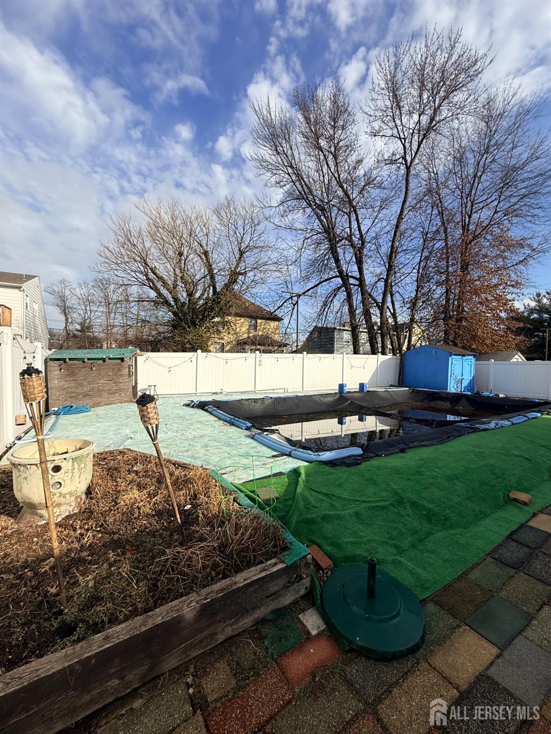27 Rector Avenue Woodbridge, NJ 07095 - Photo 29 of 29 a view of a backyard with sitting area