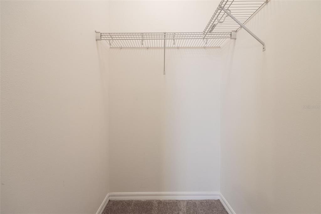 3956 Cherrybrook Loop Fort Myers, FL 33966 - Photo 24 of 44 a view of small space with racks on the wall
