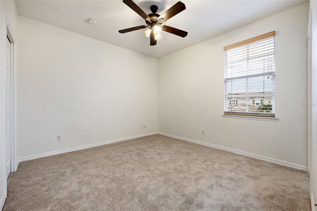 3956 Cherrybrook Loop Fort Myers, FL 33966 - Photo 25 of 44 wooden floor in an empty room with a window