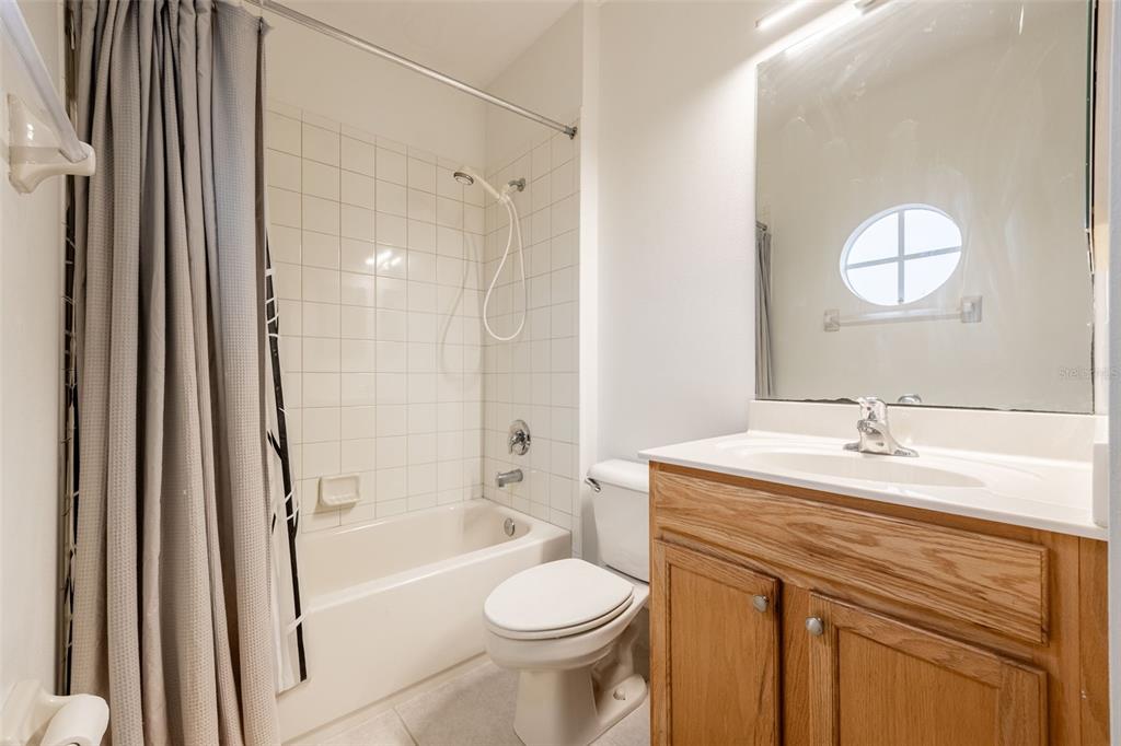 3956 Cherrybrook Loop Fort Myers, FL 33966 - Photo 26 of 44 a bathroom with a sink a toilet and a bathtub