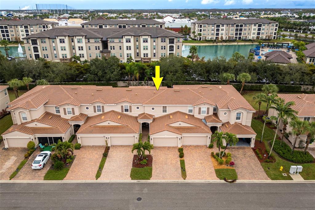 3956 Cherrybrook Loop Fort Myers, FL 33966 - Photo 33 of 44 an aerial view of multiple houses with a yard