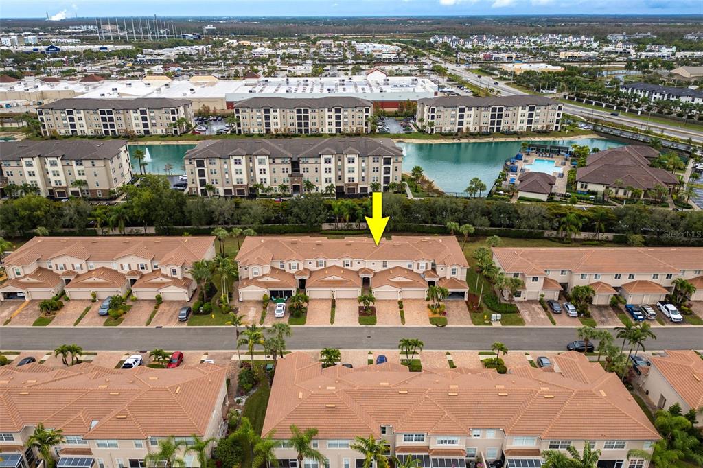 3956 Cherrybrook Loop Fort Myers, FL 33966 - Photo 34 of 44 an aerial view of lake and residential houses with outdoor space