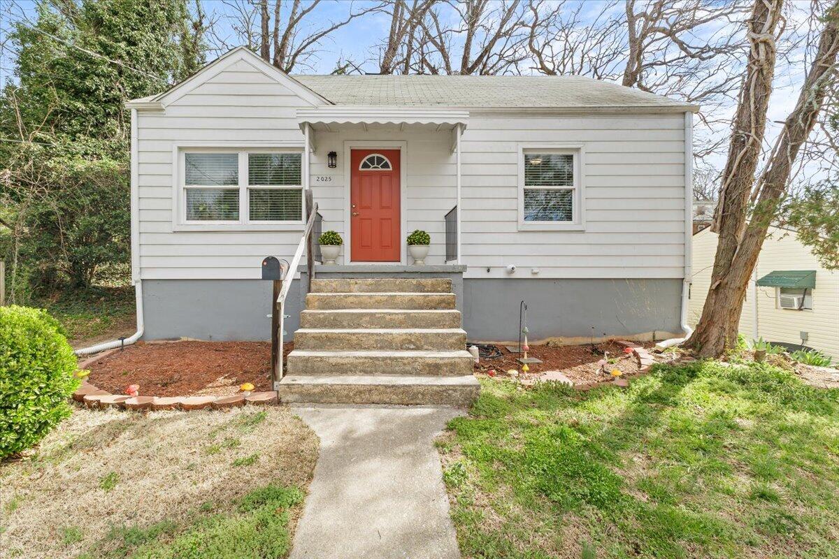 2025 Wayne Street Northeast Roanoke, VA 24012 - Photo 1 of 22 a front view of a house with a yard