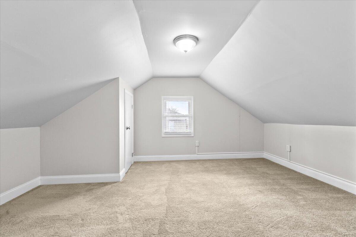 2025 Wayne Street Northeast Roanoke, VA 24012 - Photo 15 of 22 an empty room with a empty space and windows