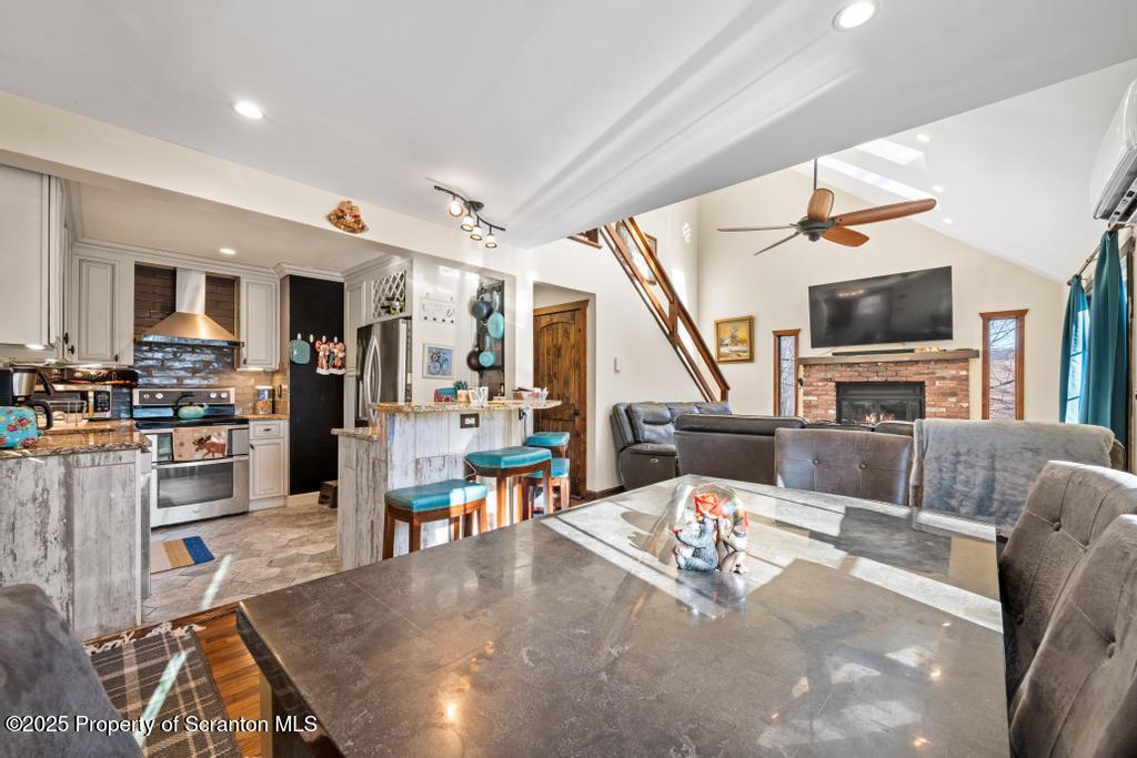 3110 Cherry Ridge Road Bushkill, PA 18324 - Photo 17 of 61 a living room with furniture and a flat screen tv
