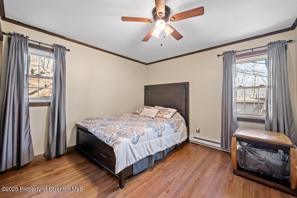 3110 Cherry Ridge Road Bushkill, PA 18324 - Photo 27 of 61 a bedroom with a bed and a window
