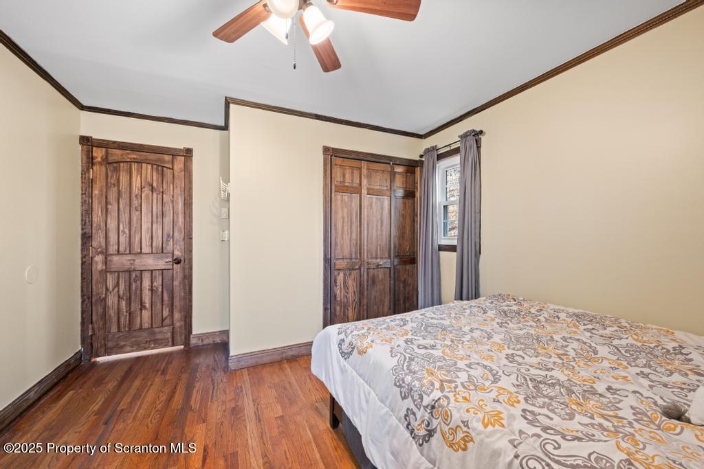 3110 Cherry Ridge Road Bushkill, PA 18324 - Photo 28 of 61 a bedroom with a bed and a window