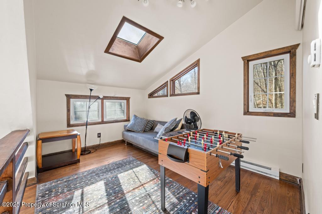 3110 Cherry Ridge Road Bushkill, PA 18324 - Photo 29 of 61 a bedroom with furniture and a window