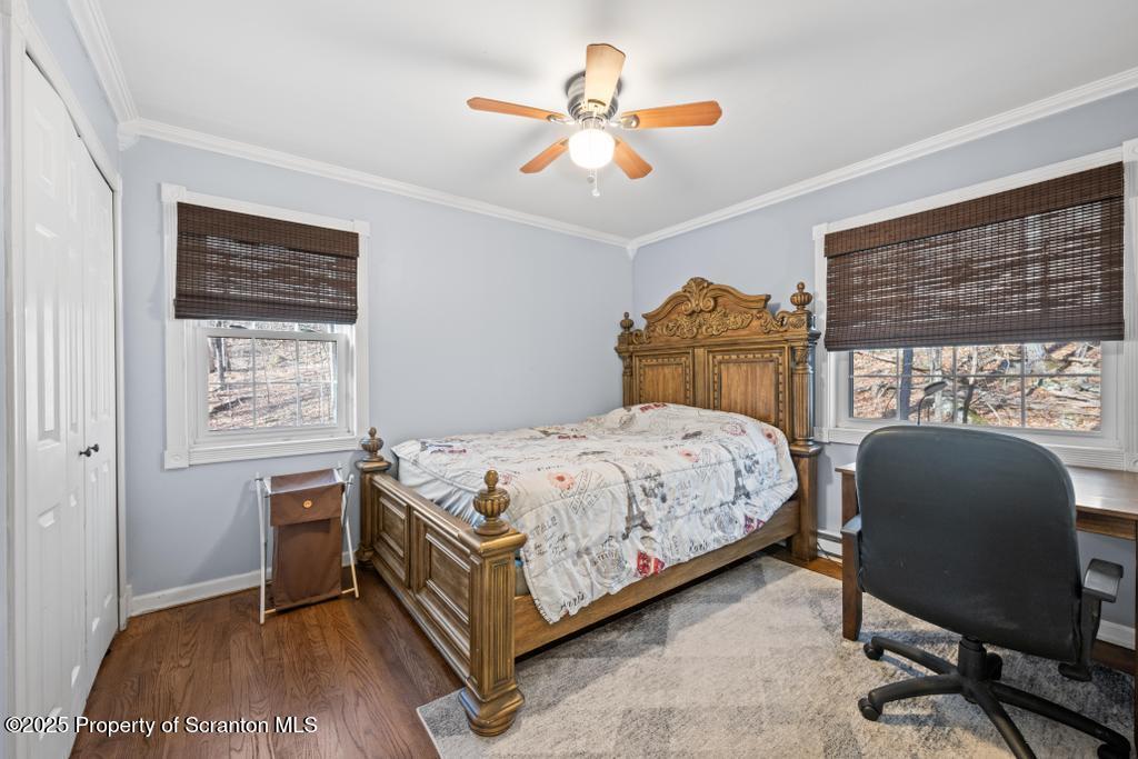 3110 Cherry Ridge Road Bushkill, PA 18324 - Photo 33 of 61 a bedroom with a bed chair and a window