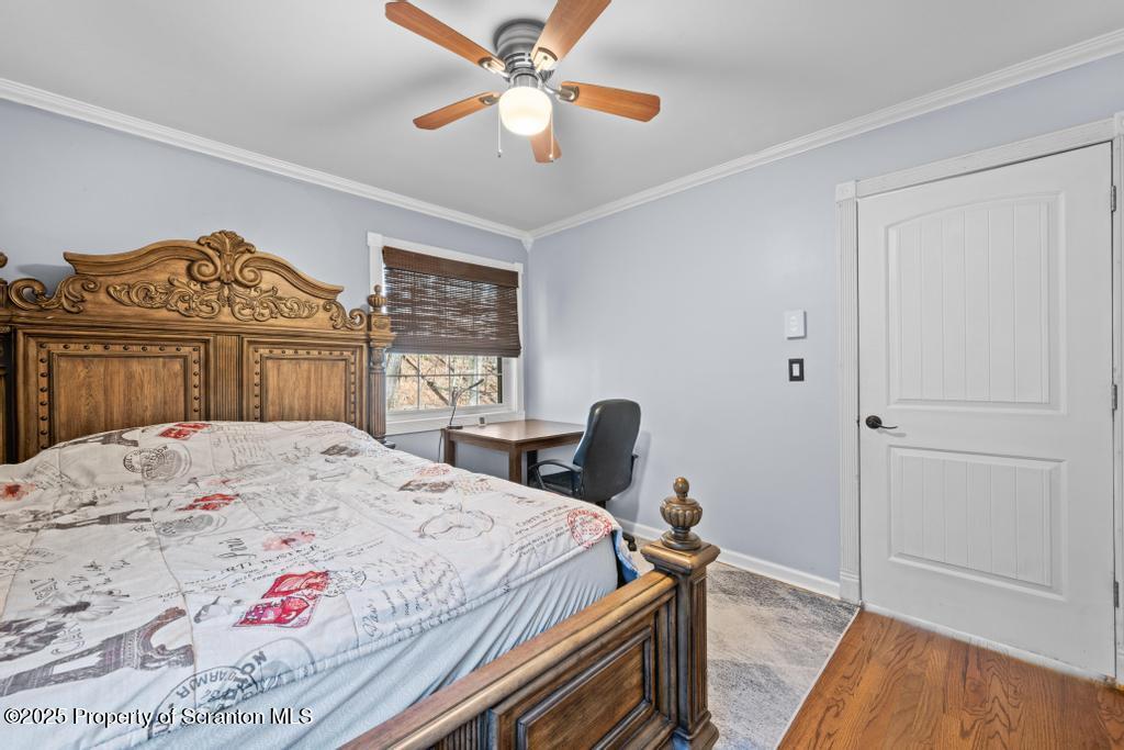 3110 Cherry Ridge Road Bushkill, PA 18324 - Photo 34 of 61 a bed sitting in a bedroom next to a window