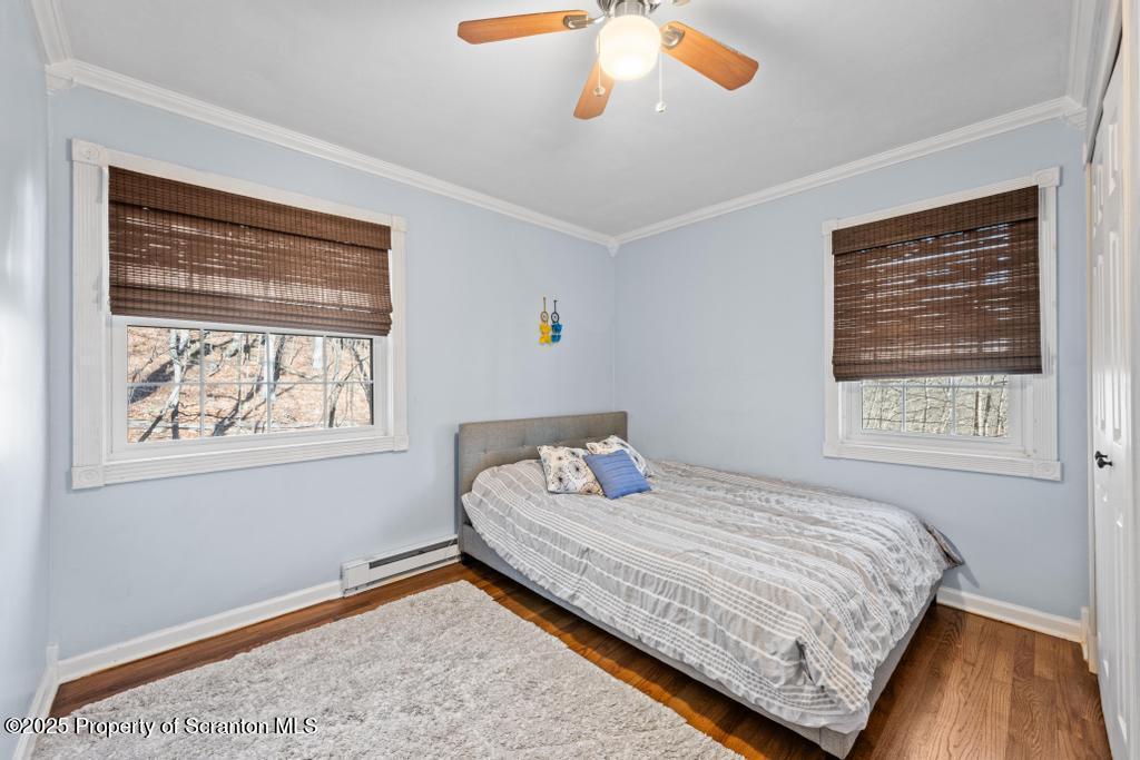 3110 Cherry Ridge Road Bushkill, PA 18324 - Photo 36 of 61 a bedroom with a bed and a window