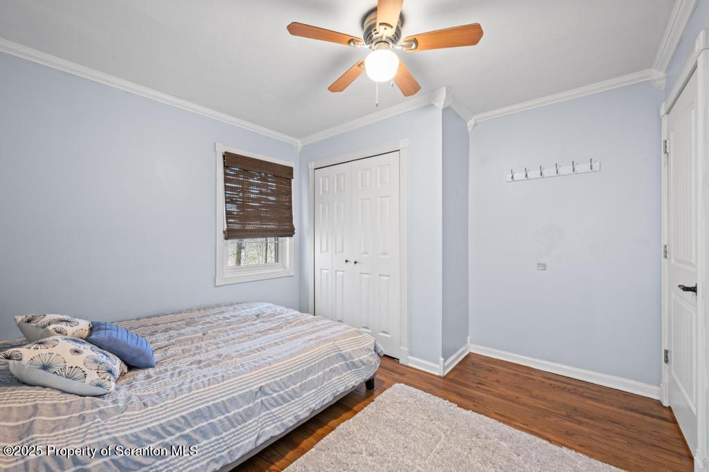 3110 Cherry Ridge Road Bushkill, PA 18324 - Photo 37 of 61 a bedroom with a bed and a window