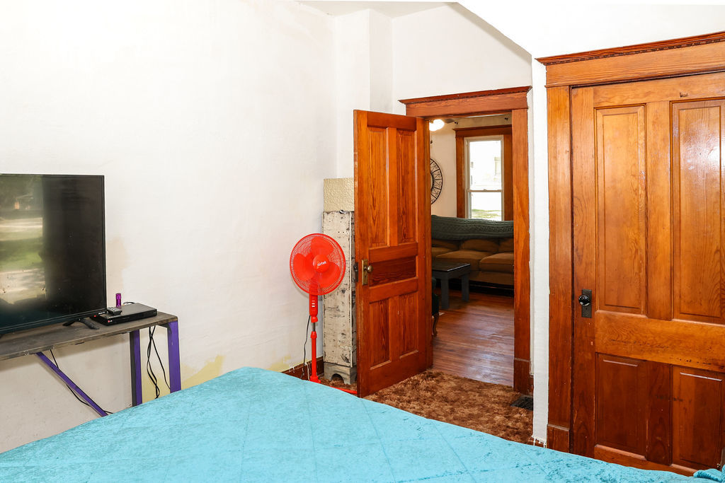 415 East Elm Street Chatsworth, IL 60921 - Photo 18 of 38 a view of a livingroom with furniture and a flat screen tv