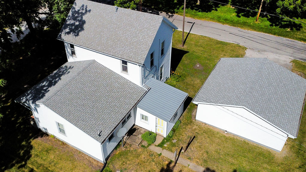 415 East Elm Street Chatsworth, IL 60921 - Photo 37 of 38 an aerial view of a house with a yard