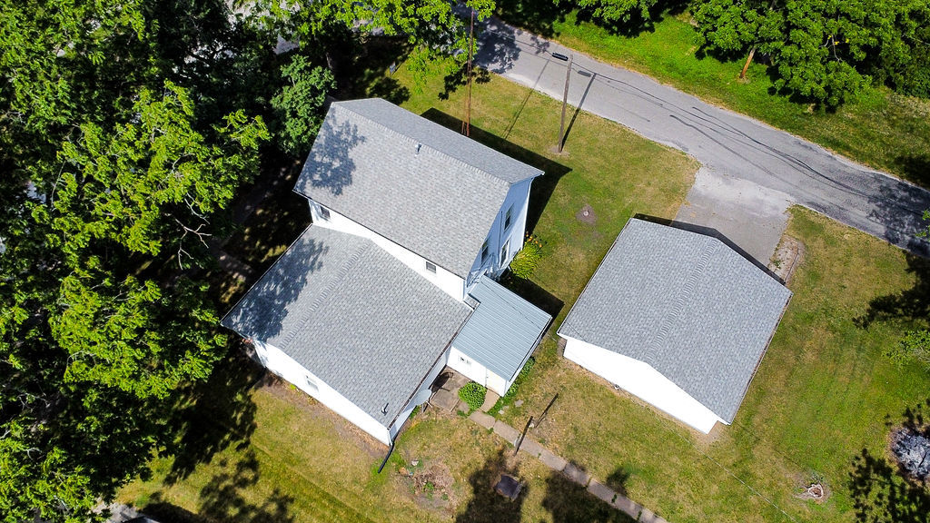 415 East Elm Street Chatsworth, IL 60921 - Photo 38 of 38 an aerial view of a house with a swimming pool