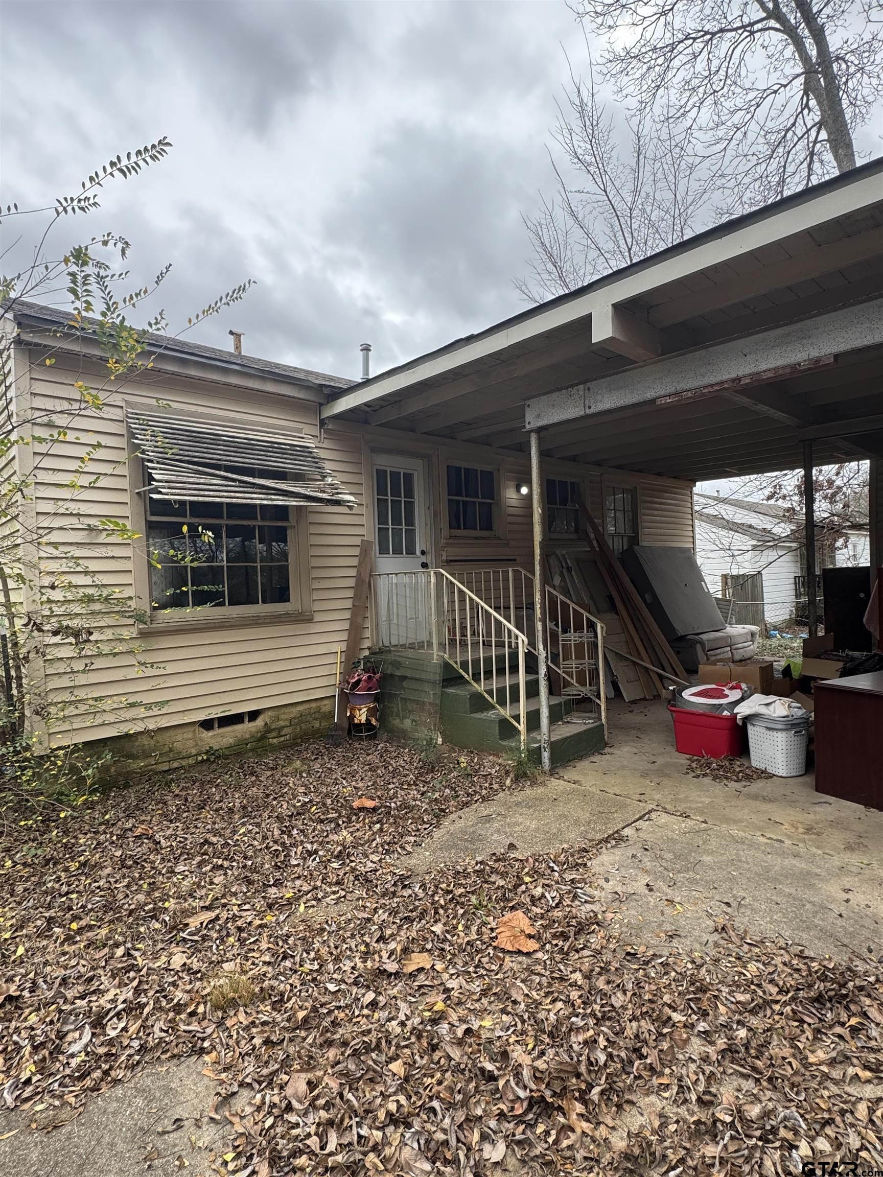 2927 New Copeland Road Tyler, TX 75701 - Photo 4 of 12 a view of a house with a patio