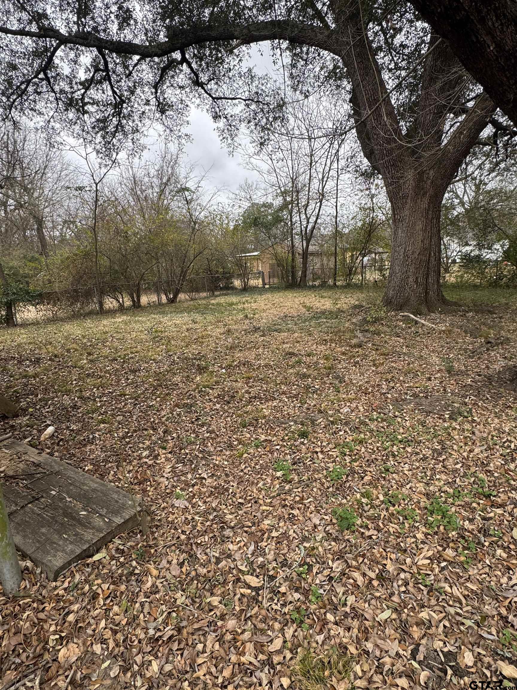 2927 New Copeland Road Tyler, TX 75701 - Photo 5 of 12 a view of house with a yard