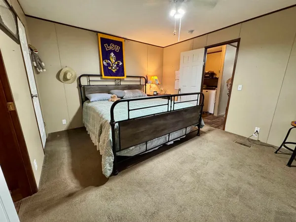 a view of a hallway with staircase