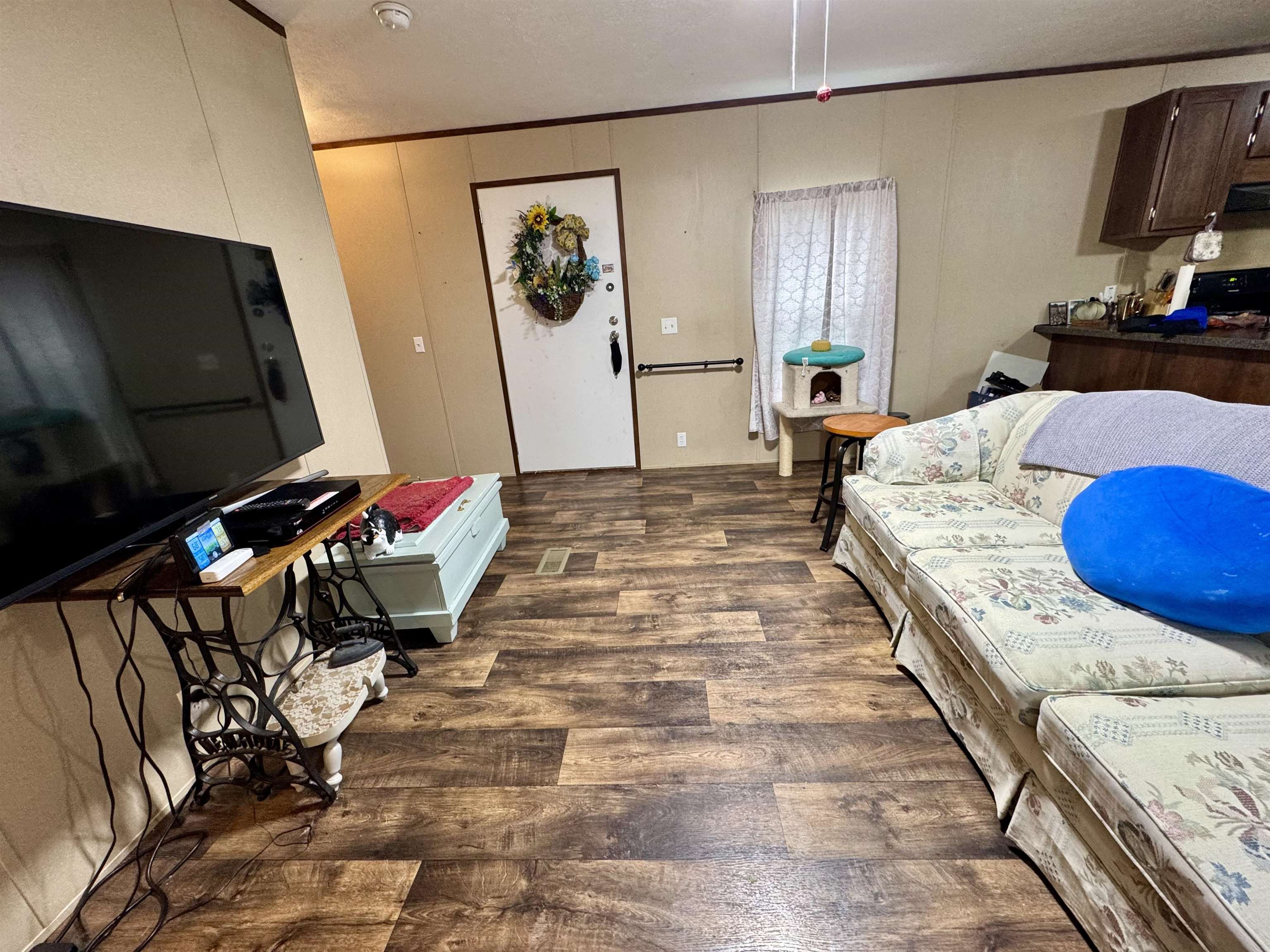 125 Elam Way Savannah, TN 38372 - Photo 18 of 36 a bed sitting in a bedroom and mirror