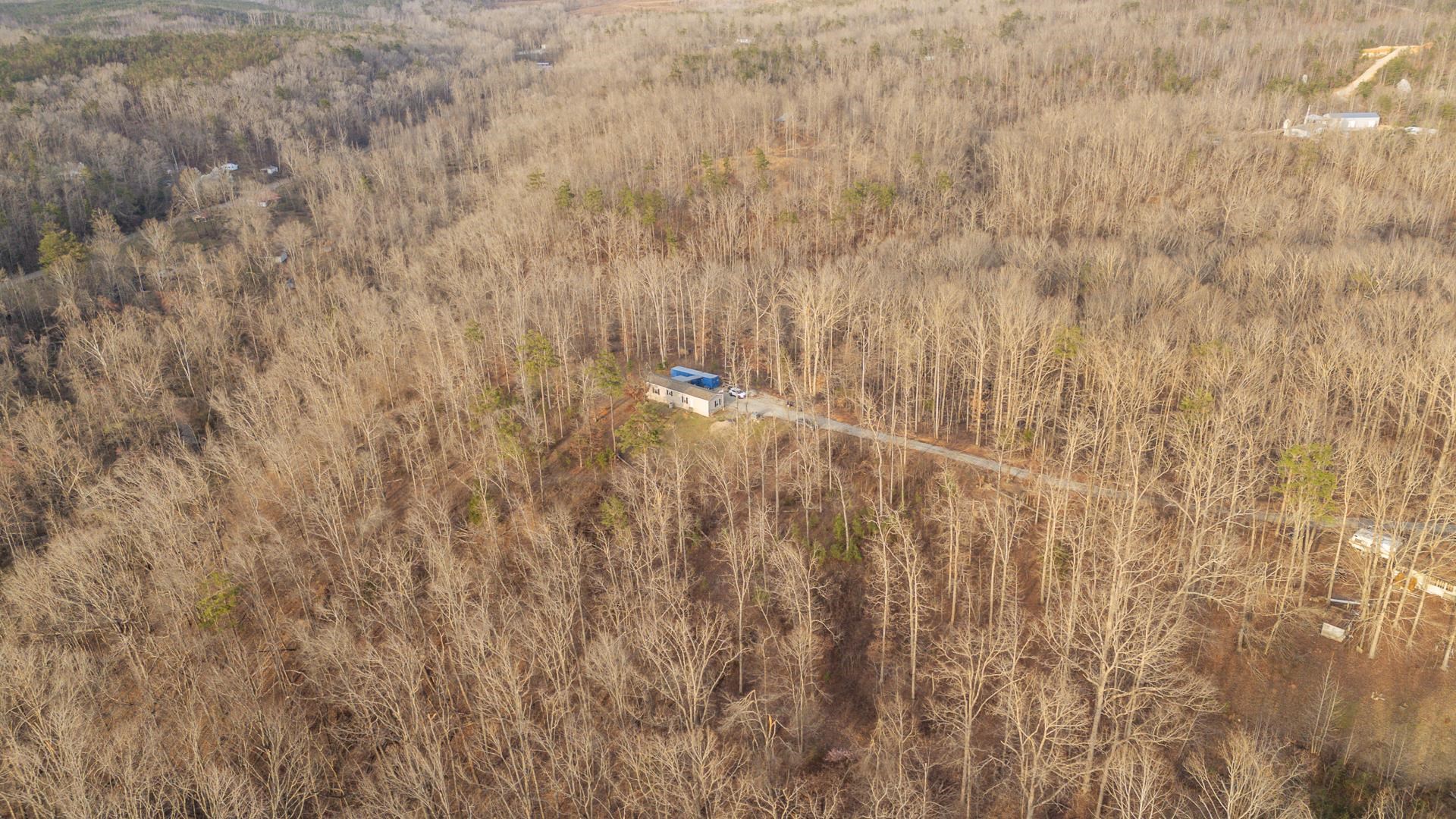 125 Elam Way Savannah, TN 38372 - Photo 32 of 36 Bird's eye view of a heavily wooded area