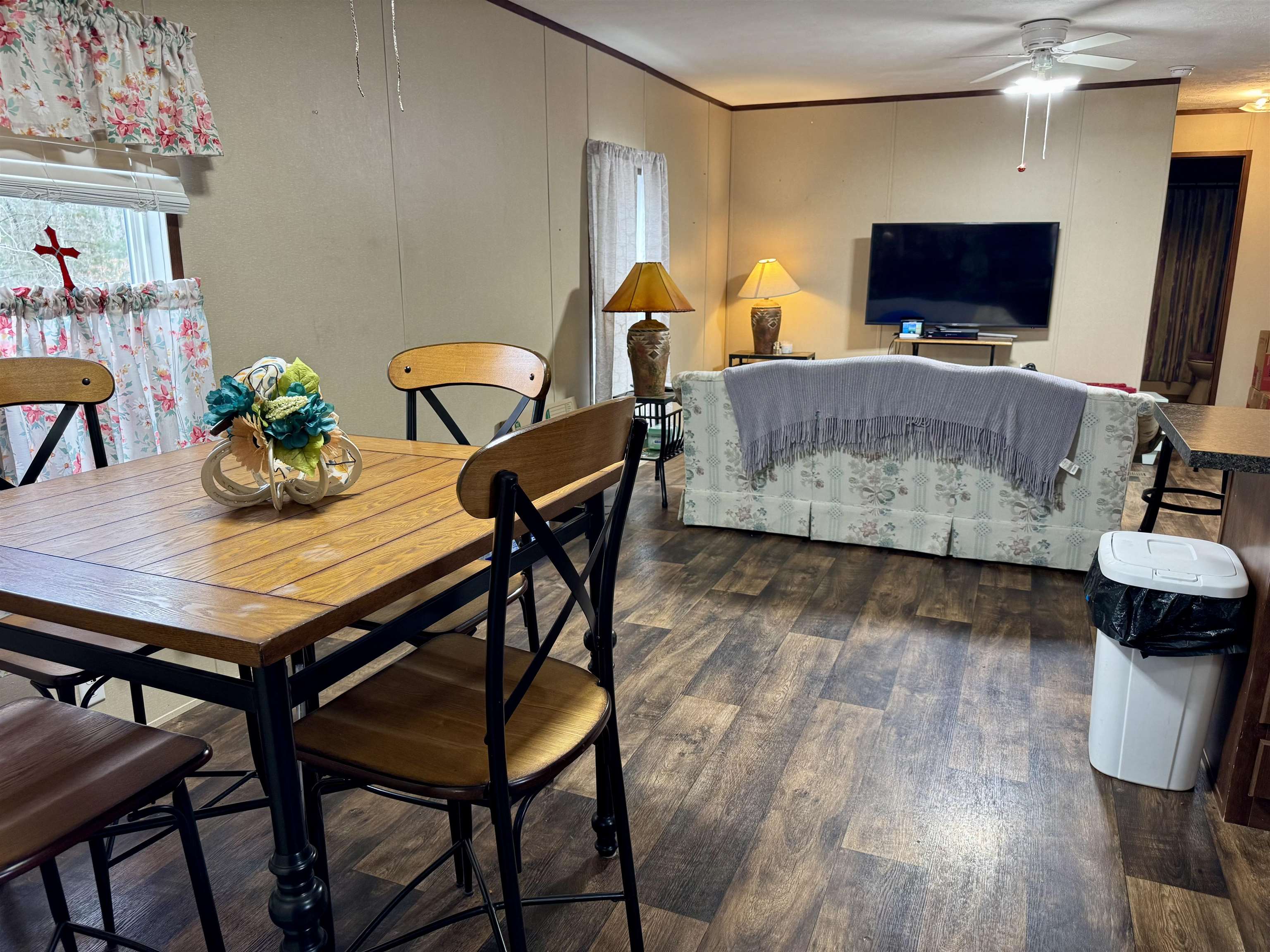 125 Elam Way Savannah, TN 38372 - Photo 6 of 36 Dining room with ceiling fan and dark wood-style flooring