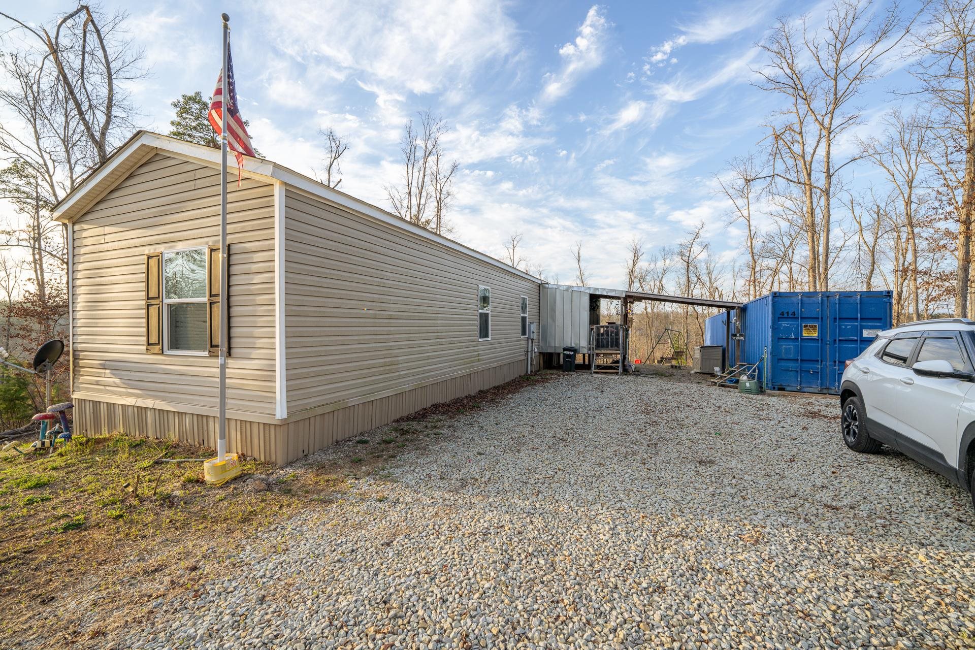 125 Elam Way Savannah, TN 38372 - Photo 10 of 36 a view of a house with a yard