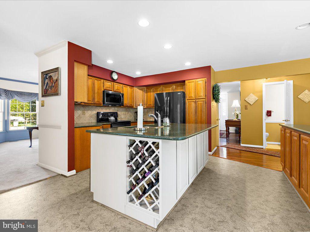 4561 Doncaster Drive Ellicott City, MD 21043 - Photo 14 of 30 Kitchen w/ Island