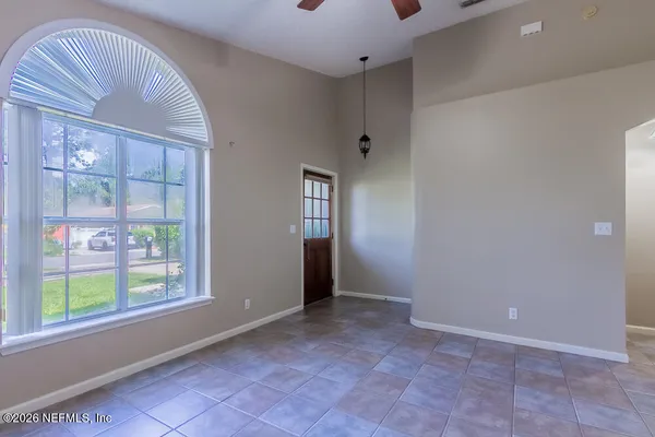 an empty room with windows