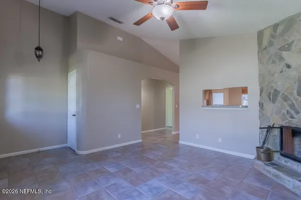 en empty room with windows