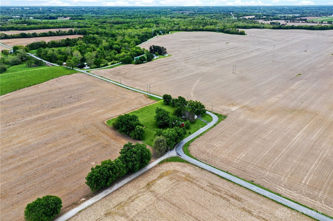 2470 Clark Run Road Xenia, OH 45385 - Photo 33 of 57 Expansive rural landscape offering fertile fields and natural green spaces under a wide-open sky.