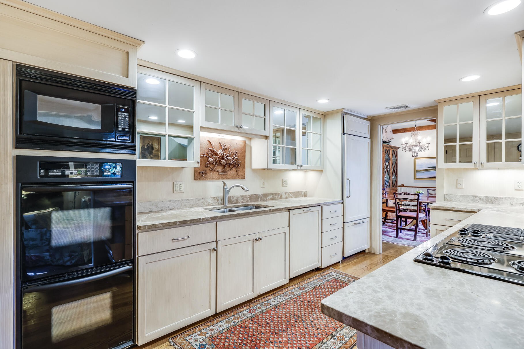 72 Hathaway Road Osterville, MA 02655 - Photo 12 of 40 a kitchen with appliances a sink and cabinets