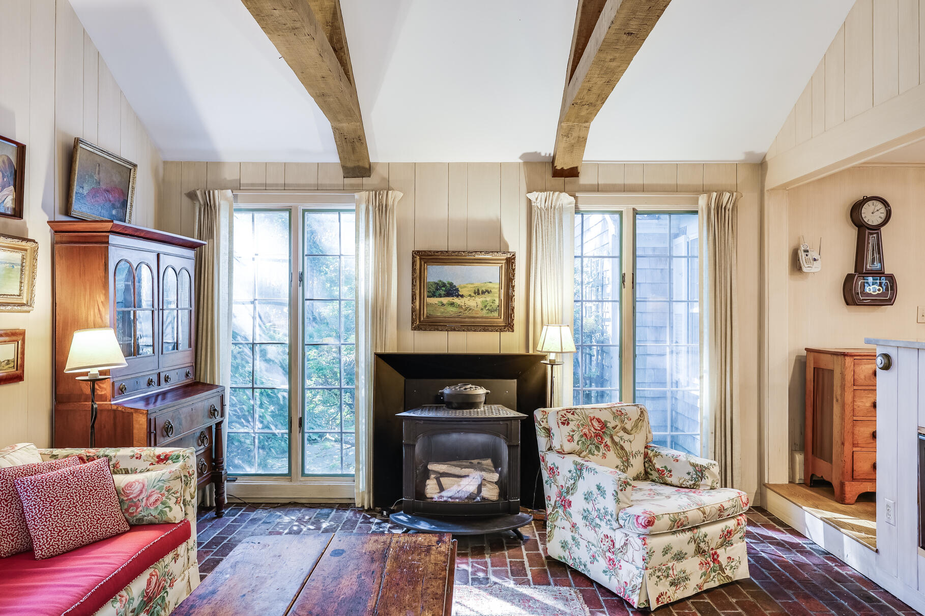 72 Hathaway Road Osterville, MA 02655 - Photo 15 of 40 a living room with furniture and a fireplace