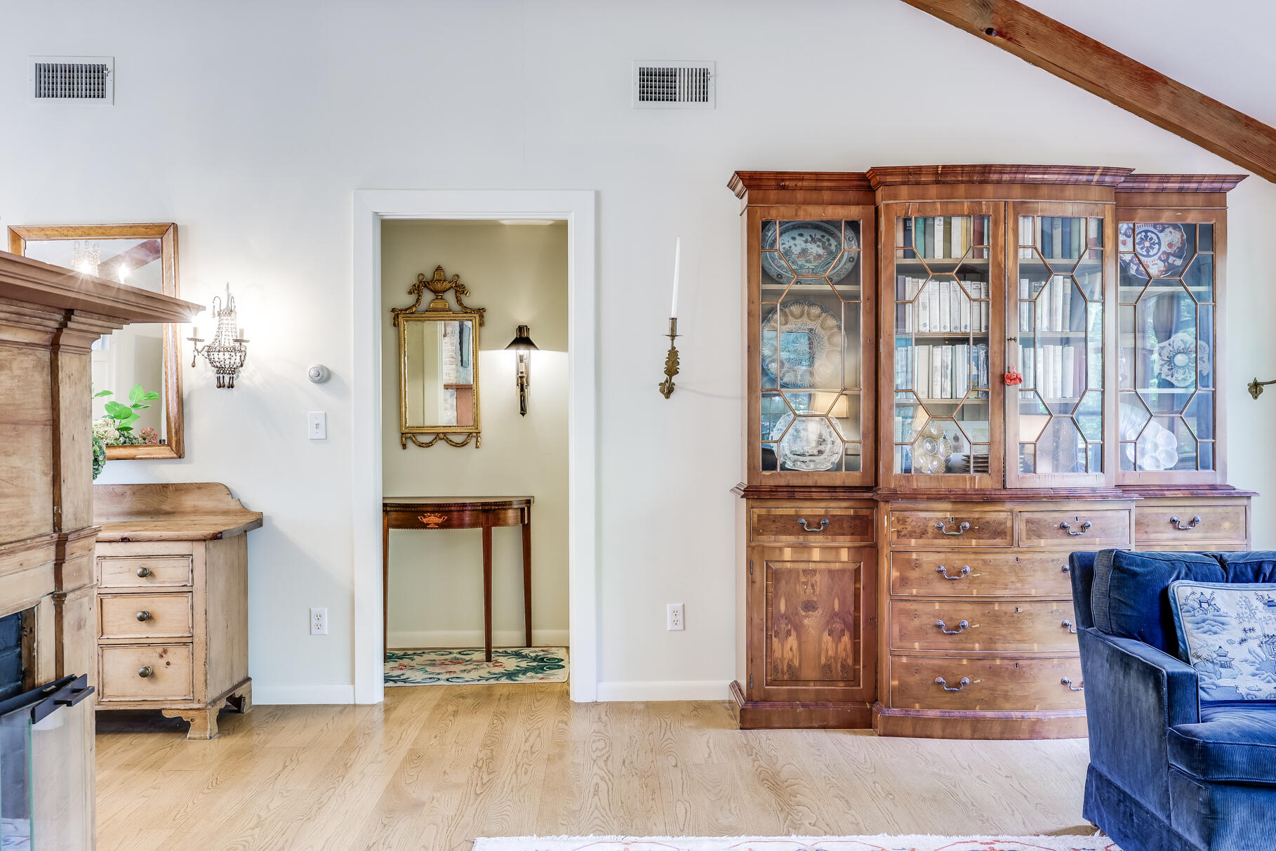 72 Hathaway Road Osterville, MA 02655 - Photo 16 of 40 a view of a hallway with wooden floor and dining room