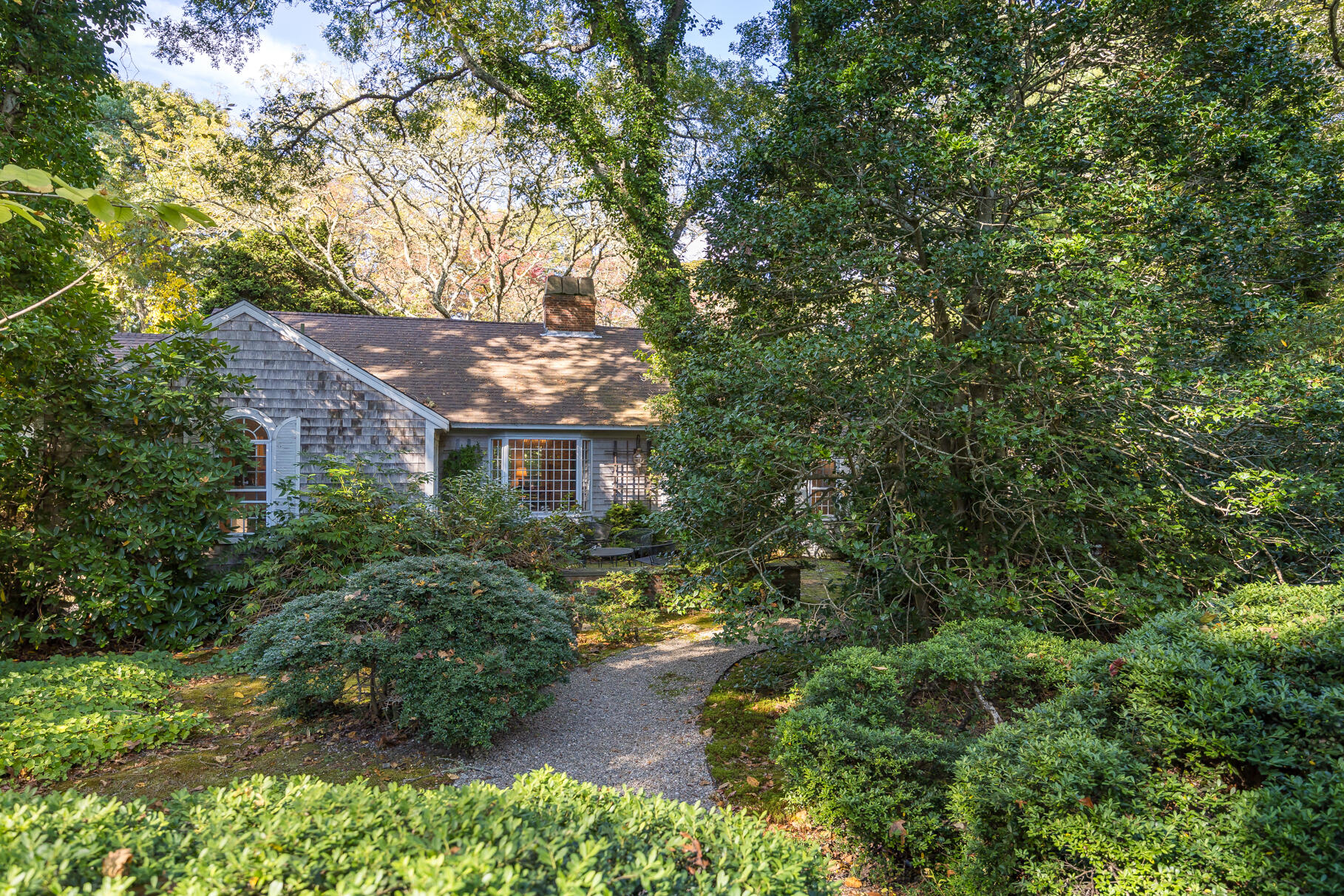 72 Hathaway Road Osterville, MA 02655 - Photo 2 of 40 a view of a big yard with plants and large trees