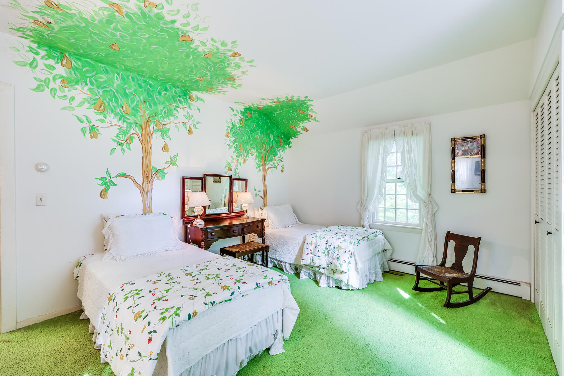 72 Hathaway Road Osterville, MA 02655 - Photo 24 of 40 a bedroom with bed and a potted plant