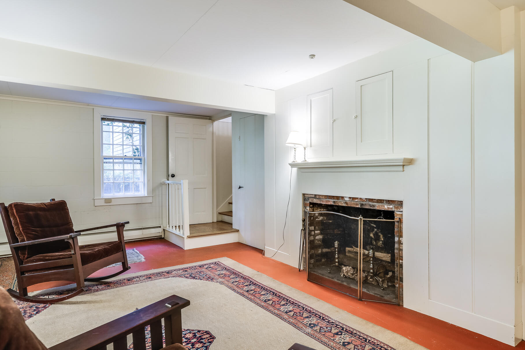 72 Hathaway Road Osterville, MA 02655 - Photo 29 of 40 a living room with furniture a fireplace and a window