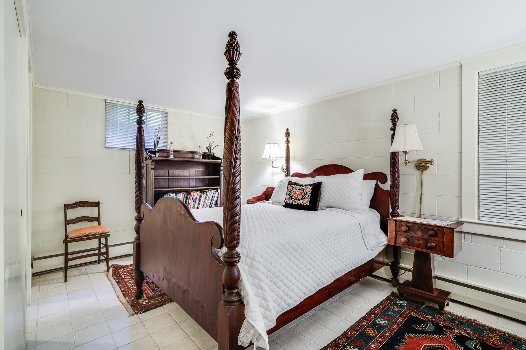 72 Hathaway Road Osterville, MA 02655 - Photo 30 of 40 a bedroom with a bed and wooden floor