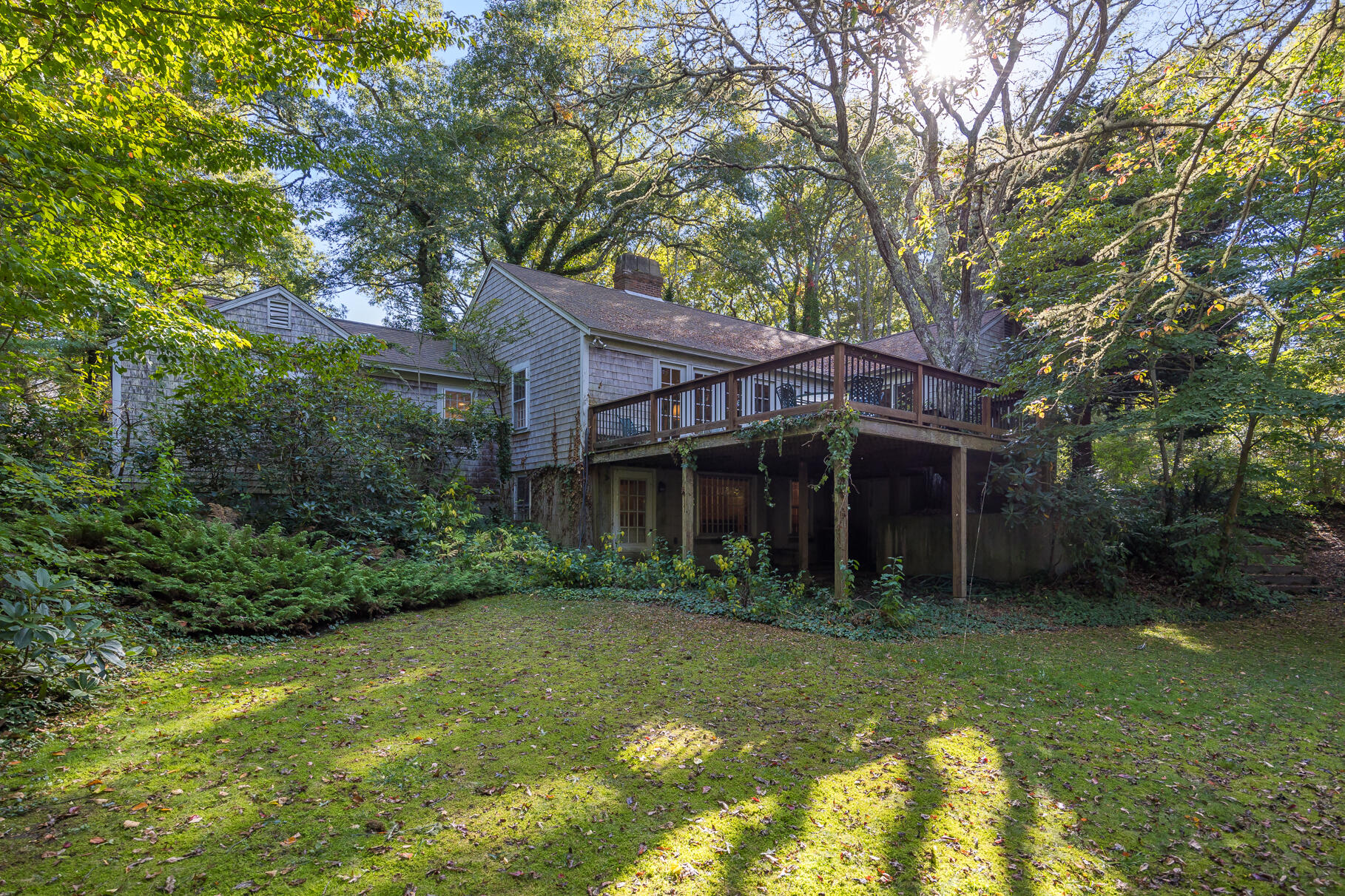 72 Hathaway Road Osterville, MA 02655 - Photo 33 of 40 a view of a house with a yard balcony and tree